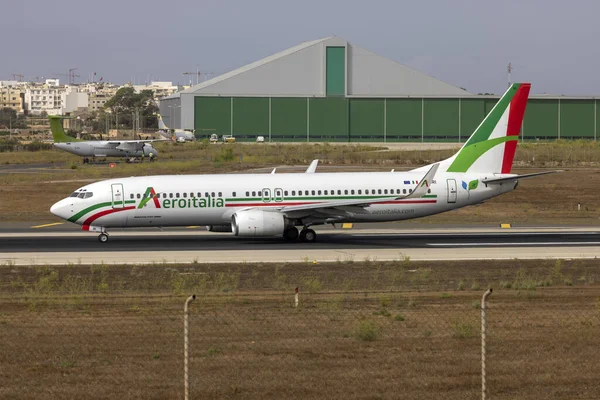 Luqa, Malta - August 19, 2022: Aeroitalia Boeing 737-85F (REG: 9H-CRI) backtracking runway 31 for takeoff.