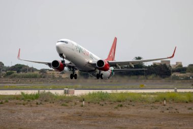Luqa, Malta - August 31, 2022: AlbaStar Boeing 737-809 (REG: EC-NGC) on take off, operating a flight for Air Malta.