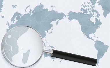 Asia centered world map with magnified glass on Comoros. Focus on map of Comoros on Pacific-centric World Map.