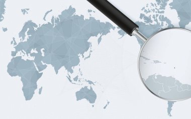 Asia centered world map with magnified glass on Dominica. Focus on map of Dominica on Pacific-centric World Map.