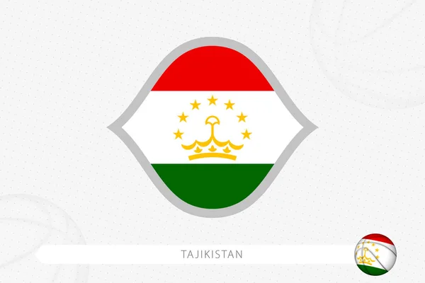灰色のバスケットボールの背景にバスケットボールの競争のためのタジキスタンの旗 — ストックベクタ