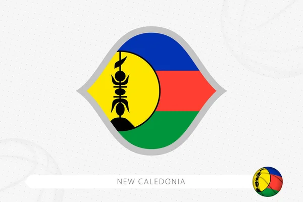 Nieuwe Caledonia Vlag Voor Basketbal Competitie Grijze Basketbal Achtergrond — Stockvector