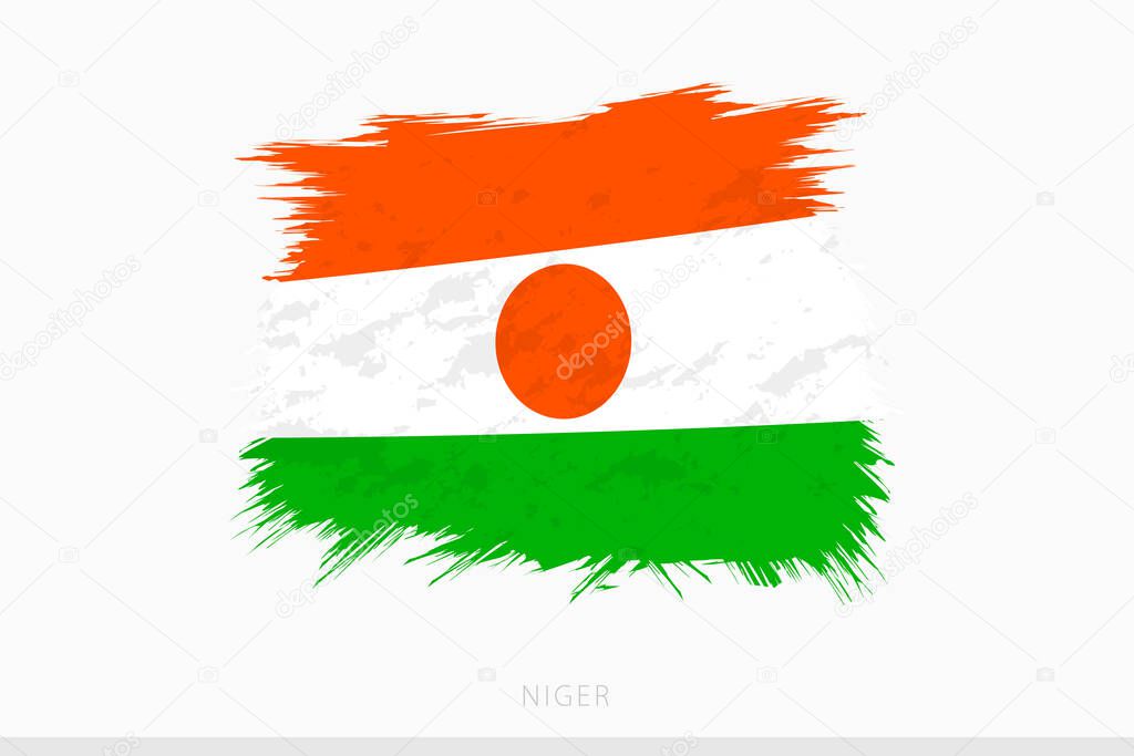 Grunge flag of Niger, vector abstract grunge brushed flag of Niger.