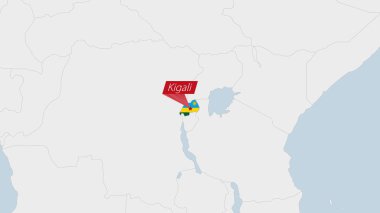Ruanda haritası Ruanda bayrağı renkleri ve ülke başkenti Kigali 'nin iğnesi ile vurgulandı.