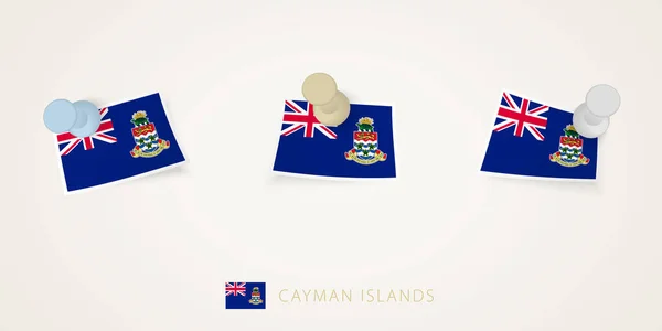 ツイストコーナーで異なる形状のケイマン諸島のピン留めフラグ ベクトルプッシュピンのトップビュー — ストックベクタ