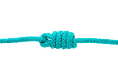 Knot on a cord close-up, isolated on a white background.