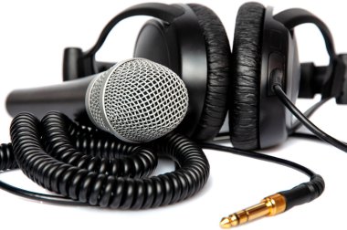 Headphone and microphone isolated on white background . Musical concept.