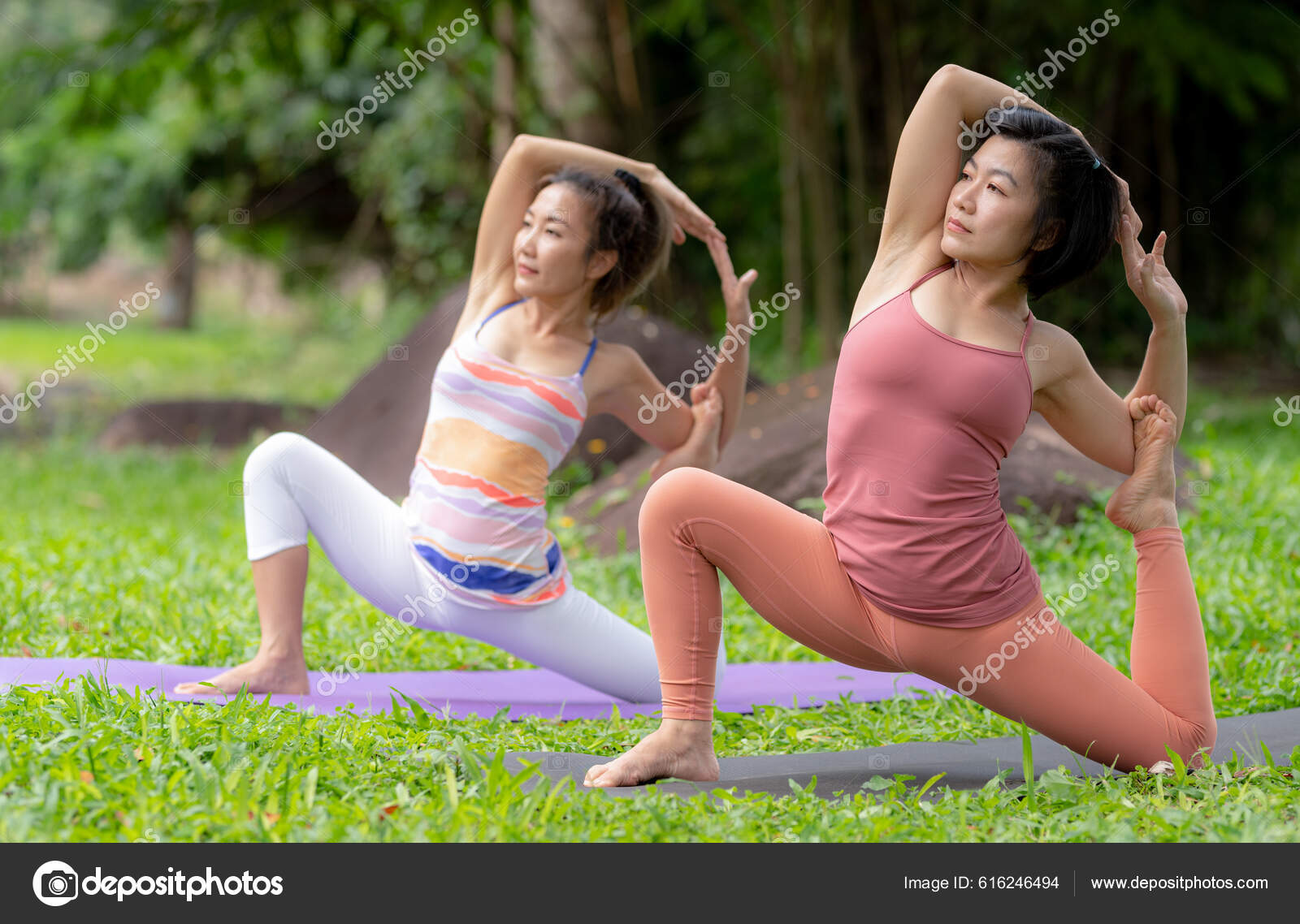 Asian woman practicing yoga on a pier at harbour at sunset, swan pose Stock  Photo - Alamy