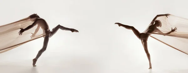Ballerini di danza moderna. Arte contemporanea. Giovane flessibile atletico uomo e donna in calzamaglia. Concetto di danza grazia, ispirazione, creatività — Foto Stock