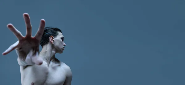 Half-length portrait of young man, flexible male contemp dancer dancing isolated on old navy studio background. Flyer — Stock Photo, Image