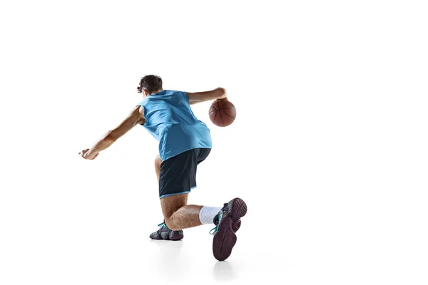 Back view of professional basketball player in blue sports uniform training isolated on white studio background. — Stock Photo, Image