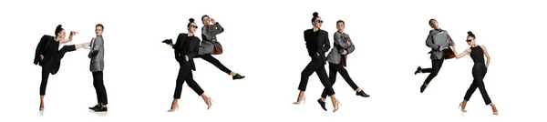 Zwei stylische Büroangestellte in Business-Anzügen in Aktion, isoliert auf weißem Hintergrund. Kunst, Schönheit, Mode und Geschäftskonzept — Stockfoto