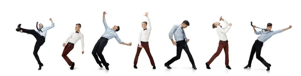 Felices trabajadores de oficina bailando, jugando juegos deportivos, cantando en ropa de estilo empresarial o traje en blanco. — Foto de Stock