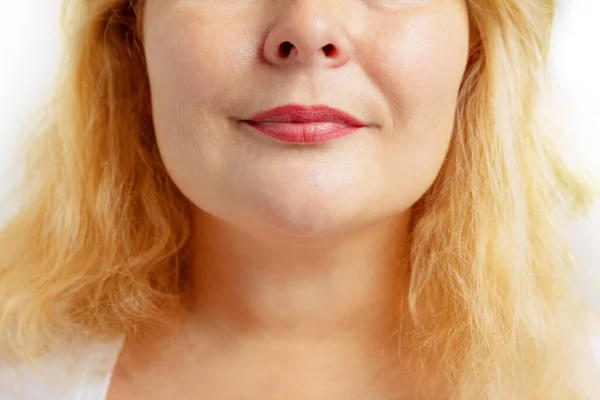 Close-up of female mouth with closed lips without makeup. Anti-aged cosmetology, medicine, dental health. Detailed. — Stock Photo, Image