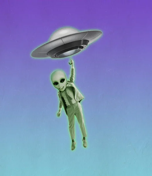 Emotional green alien with human body wearing business suit flying on UFO. Contemporary art collage. — Stock Photo, Image