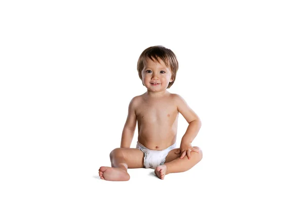 Happy little boy, baby, child in diaper isolated over white studio background. Childhood concept — Fotografia de Stock
