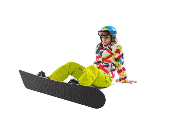 Porträtt av ung kvinna i ljusa sportkläder, goggles och hjälm snowboard isolerad på vit studio bakgrund. Begreppet vintersport — Stockfoto