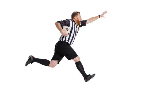 Dynamic portrait of soccer or football referee running with football ball isolated on white studio background. Concept of sport, rules, competitions, rights, ad, sales. — Stock Photo, Image