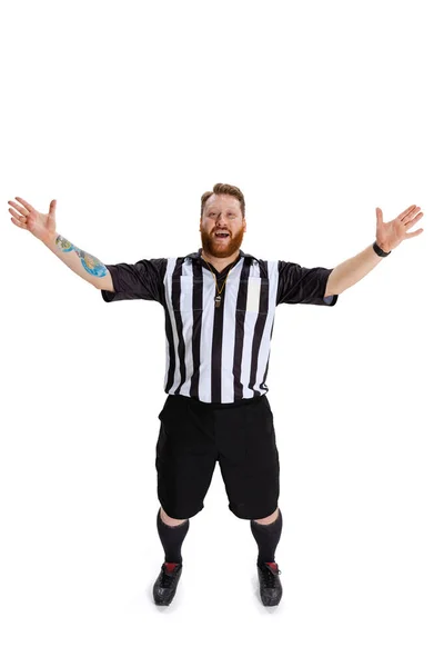 Full-length portrait of soccer or football referee wearing field judge uniform isolated on white studio background. Concept of sport, rules, competitions, rights, ad, sales. — Stock Photo, Image