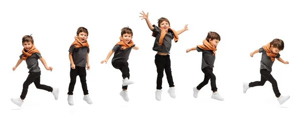 Colagem com imagens de pequeno garoto bonito, menino feliz pulando, correndo isolado no fundo do estúdio branco. Educação, emoções, conceito de infância. — Fotografia de Stock