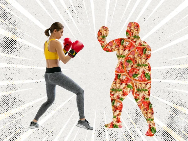 Sportiv ung smal flicka bär sport uniform boxning med stor kropp fylld pizza isolerad på grå bakgrund. Begreppet hälsosam livsstil, viktminskning. — Stockfoto