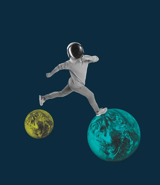 Conceptual creative artwork with young man in helemet walking on outer space background. Concept of astronautics, dreams, astronomy, art, Day of Human Space Flight — Stock Photo, Image