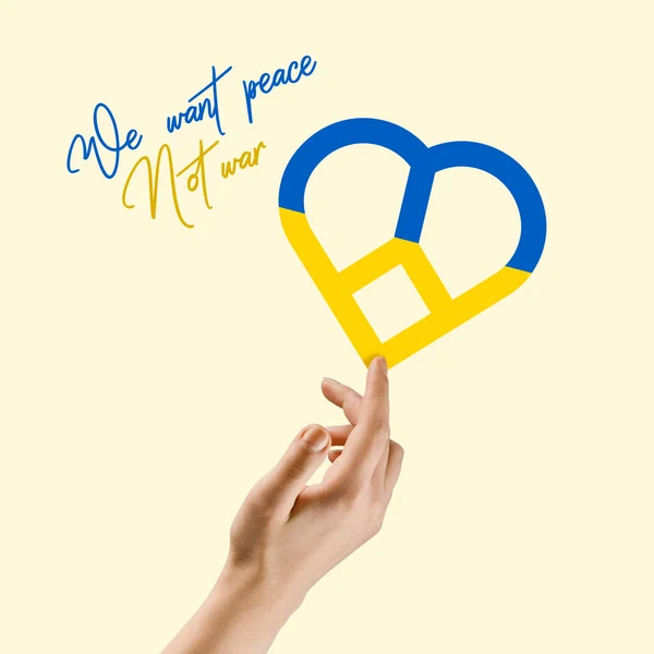 Contemporary art collage. Male hand reaching ukrainian heart shape covered with blue and yellow flag colors symbolizing peace