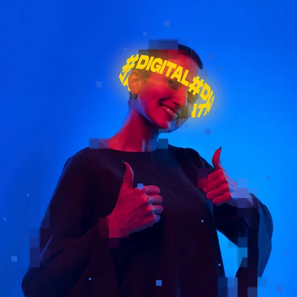 Contemporary art. Young smiling girl with pixel head elements and neon lettering around isolated over blue background in neon light — Stock Photo, Image