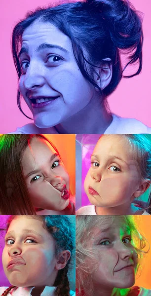 Conjunto vertical de rostros cercanos de niñas y niños aplastados sobre vidrio aislado sobre fondo de color. Concepto de emociones, expresiones, diversidad. —  Fotos de Stock
