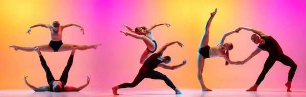 Dois dançarinos, casal esportivo elegante, modelos masculinos e femininos dançando dança contemporânea em gradiente colorido fundo rosa amarelo em luz de néon. — Fotografia de Stock