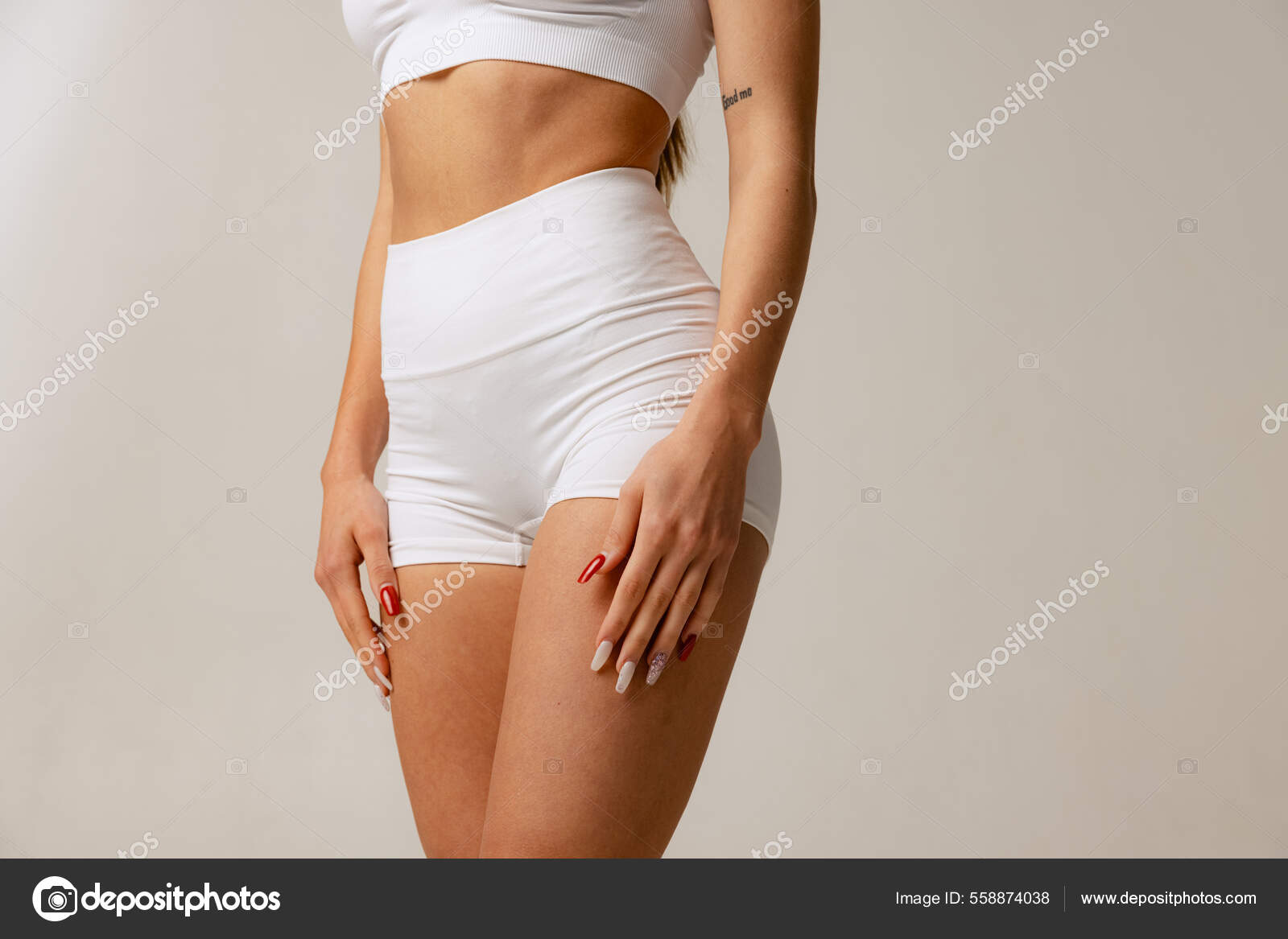 Foto de Body Beauty, Sexy Woman in Cotton Underwear Lying Down on Side,  Slim Girl Isolated over White Background do Stock