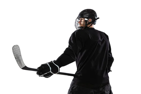 Vista posterior retrato de jugador de hockey profesional posando aislado sobre fondo blanco estudio — Foto de Stock