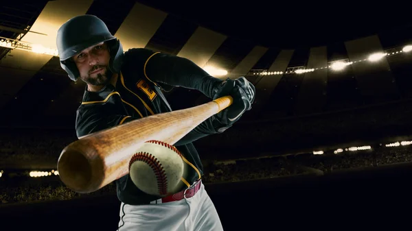 Poster with professional baseball player with baseball bat in action during match in crowed sport stadium at evening time. Sport, win, winner, competition concepts. — Stock Photo, Image