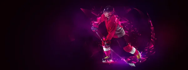 Young man, professional hockey player in protective uniform training isolated on dark background polygonal, fluid neon elements. Concept of sport — ストック写真