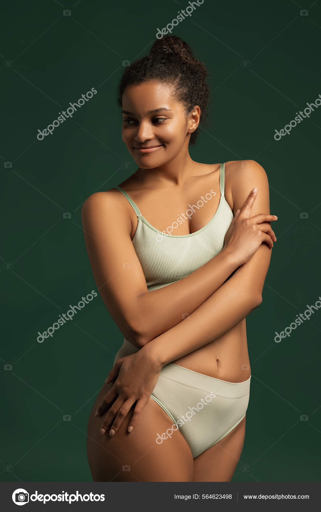 Portrait of young beautiful woman posing in comfortable cotton