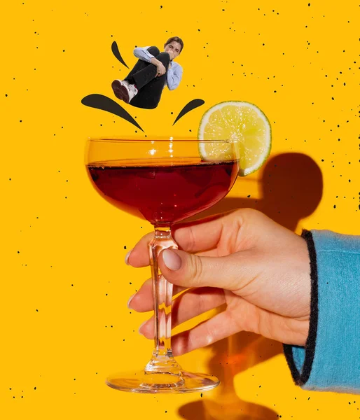 Contemporary art collage. Young woman jumping into manhattan cocktail isolated over bright yellow background. Concept of alcoholic drinks — Fotografia de Stock