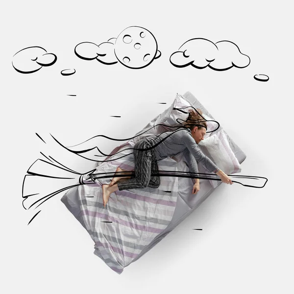 Creative image. Top view of young man lying on bed, sleeping, dreaming about witcher flying on a broomstick — Stockfoto