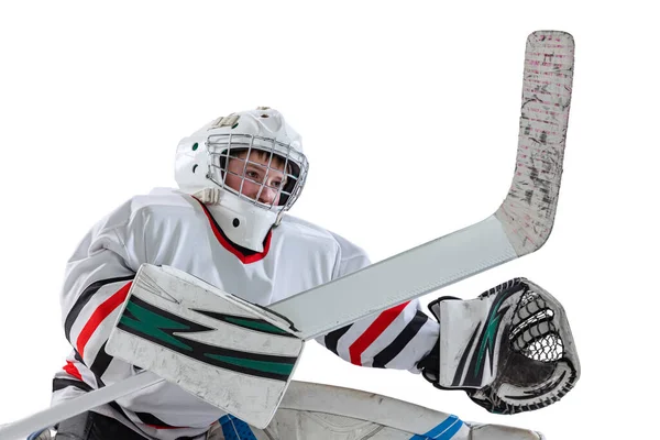 Portrait of young boy, sportsman training, playing hockey isolated over white studio background — Stock Photo, Image