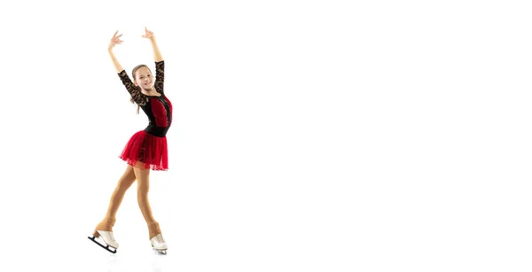 Flyer. Portrait of little flexible girl, figure skater wearing stage attire posing isolated on white studio background. Concept of movement, sport, beauty. — Stock Photo, Image