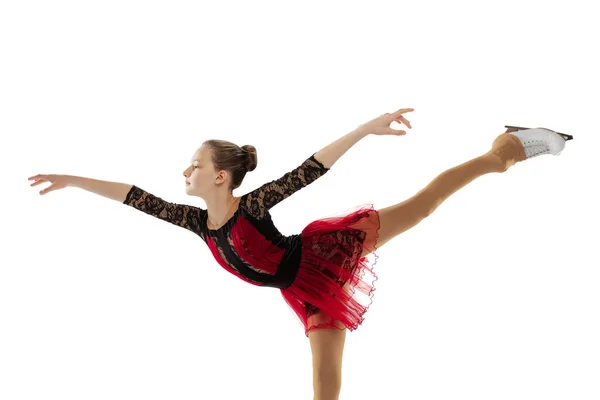 Portrait of little flexible girl, figure skating wearing stage attire posing isolated on white studio backgound. Concept of movement, sport, beauty. — Stock Photo, Image