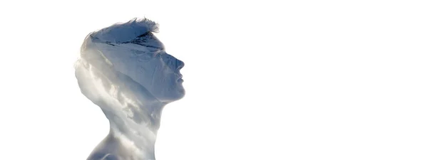 Conceptual image. Profile silhouette of young transparent man and nature landscape of snowy mountains isolated over white background. — Stok fotoğraf