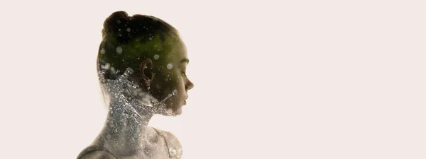 Conceptual image. Transparent silhouette of young tender woman and water splashes around grass isolated over grey background — Stok fotoğraf