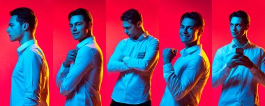 Beyaz tişörtlü, gülümseyen, yüzünü çeviren, kırmızı stüdyo ışıklarıyla izole edilmiş genç bir adamın portreleri..