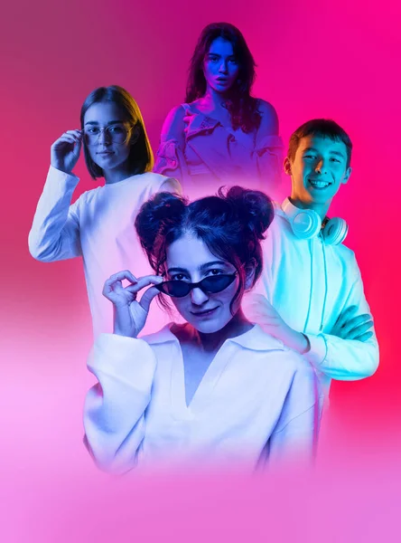 Poster with for beautiful male and female models on magenta color background in neon light, filter. Concept of emotions, youth, fashion, ad — Stockfoto