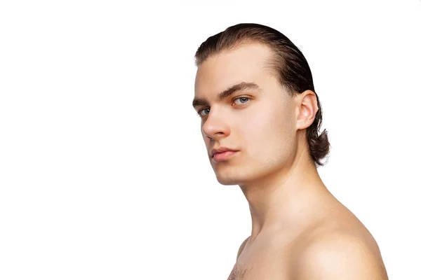 Male beauty. Studio shot of young handsome man isolated on white studio background. Concept of mens health, antiage, self-care, body and skin care. — Photo