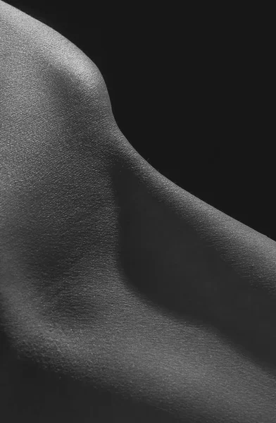 Detailed texture of human female skin. Close up part of womans body. Skincare, bodycare, healthcare, hygiene and medicine concept. Macro photography — Zdjęcie stockowe
