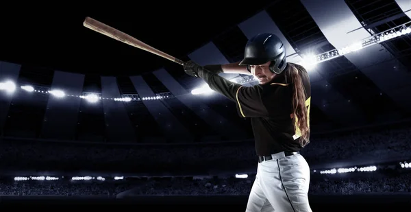 Powerful hit. Poster with baseball player with baseball bat in action during match in crowed sport stadium at evening time. Sport, win, winner, competition concepts. Collage, flyer for ad, text