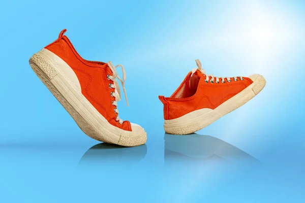 Walk Strolling Sports White Orange Shoes Blue Background Sneakers Trainers — Stockfoto
