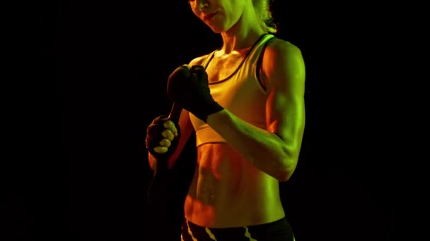 Sportive Girl Boxer Wrapping Hands Fighting Slow Motion Neon Light — Stockvideo