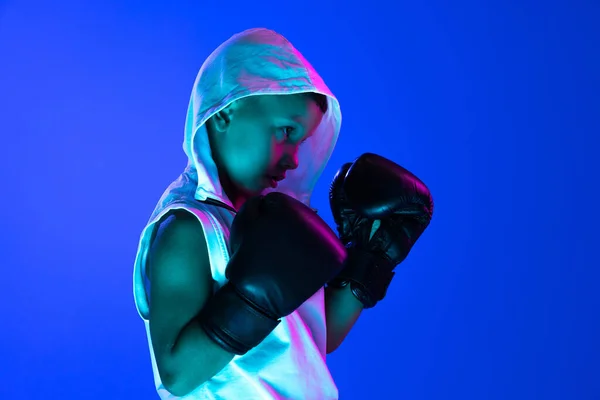 Stylish Boy Beginner Boxer Training Isolated Blue Background Neon Light — Stok fotoğraf